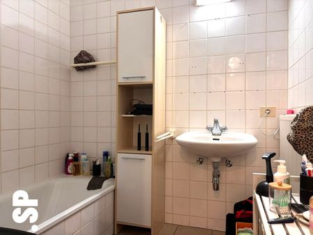 Appartement met 2 slaapkamers en terras in het centrum van Oevel. - foto 2