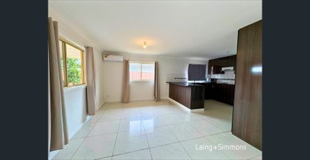 Modern two-bedroom home with water included - Photo 4