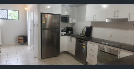 Stylish Fully Furnished Two-Bedroom Unit in Desirable Complex - Photo 5