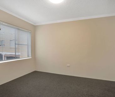 MODERN TWO BEDROOM UNIT WITH TANDEM LOCK UP GARAGE! - Photo 3