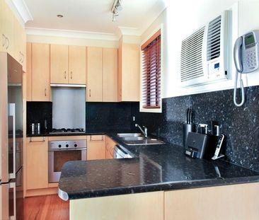 3 Bedroom Home with the Garage You've Been Looking For! - Photo 4