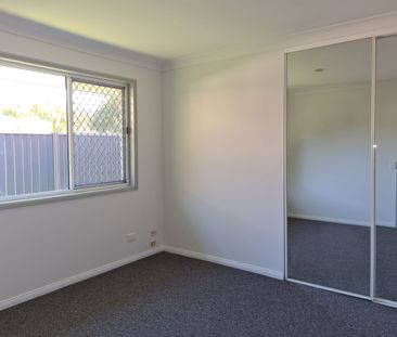 Freshly Renovated Family Friendly 4 Bedroom Home Located in Robina - Photo 4