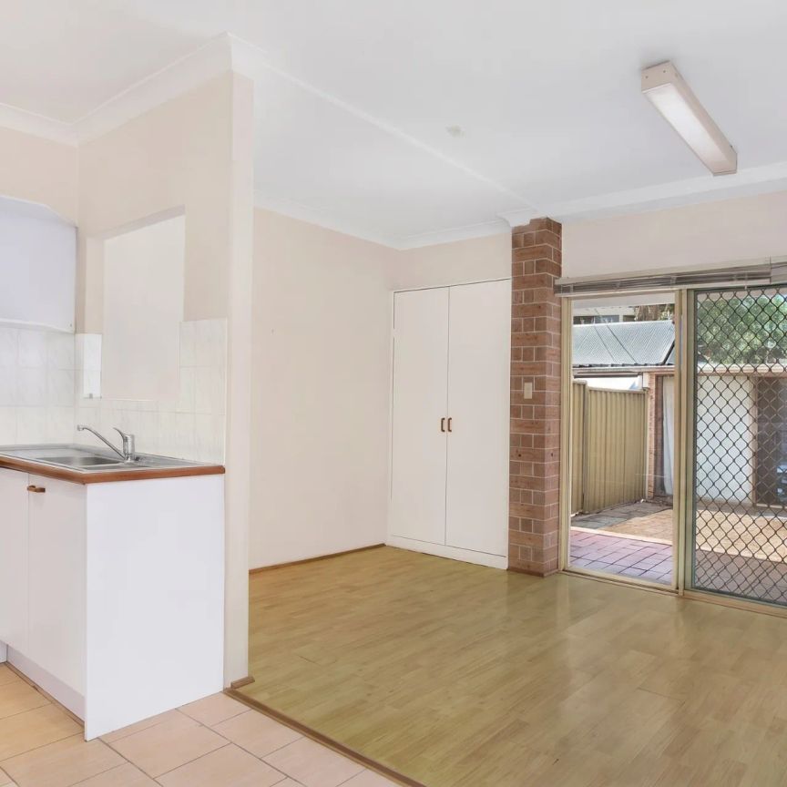 Three Bedroom Terrace with Rear Lane Access Garage - Photo 1