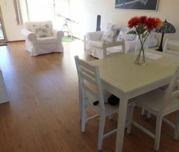 Fully Furnished apartment by the Lake with a Pool - Photo 1
