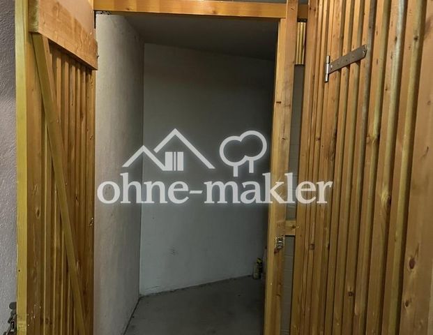 Helle Dachgeschosswohnung mit Tiefgaragenstellplatz - Foto 1