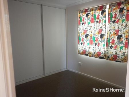 LOW SET FULLY FENCED FAMILY BRICK HOME - Photo 3