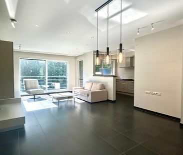 Modern appartement met 2 slaapkamers en garagebox te Leuven - Photo 1