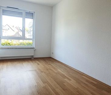 CITYHOUSE: Moderne, renovierte Energiesparwohnung(KFW 40) mit Parkett, Balkon und PKW Stellplatz. - Photo 4