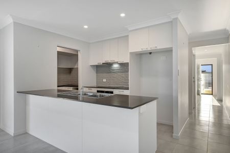 Modern Family Home with Pool in Prime Mount Low Location - Photo 2