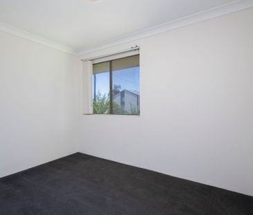 Tidy 2 Bedroom with Air Conditioning - Photo 6