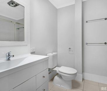 Stylish Renovated Townhouse Offering Low-Maintenance Living in Prim... - Photo 4