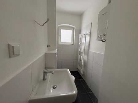 3-Zimmer-Wohnung in Wilhelmshaven City mit ebenerdiger Dusche! - Photo 4