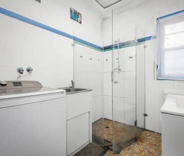 Spacious 3-Bedroom Brick Home on a Large Corner Block - Photo 2