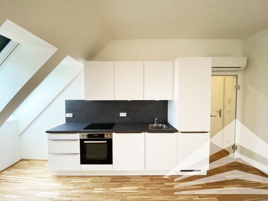 Klimatisierte 2 Zimmer DG-Neubauwohnung mit Küche - Nähe Herz Jesu Kirche - Photo 1