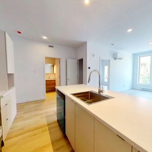 3 1/2 DANS IMMEUBLE NEUF - Photo 2