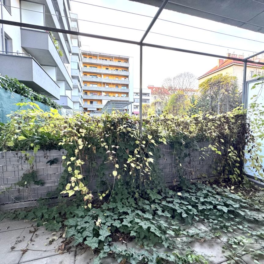 Luftiges Raumgefühl dank 3 Meter hohen Decken - Hofseitig mit Terrasse - Photo 1