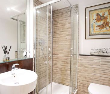 Well-located contemporary art deco style two bed apartment with sec... - Photo 2