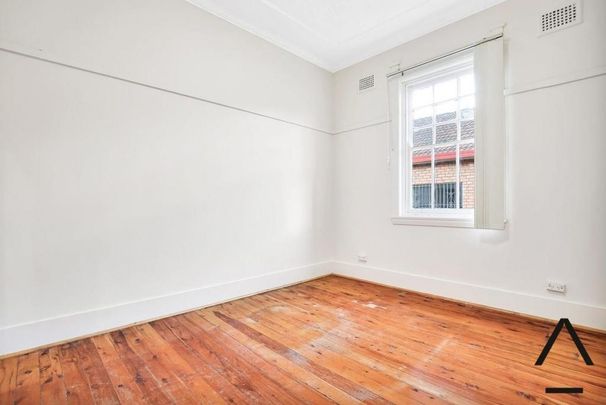 Two Bedroom Duplex Masterpiece Offering Convenience - Photo 1