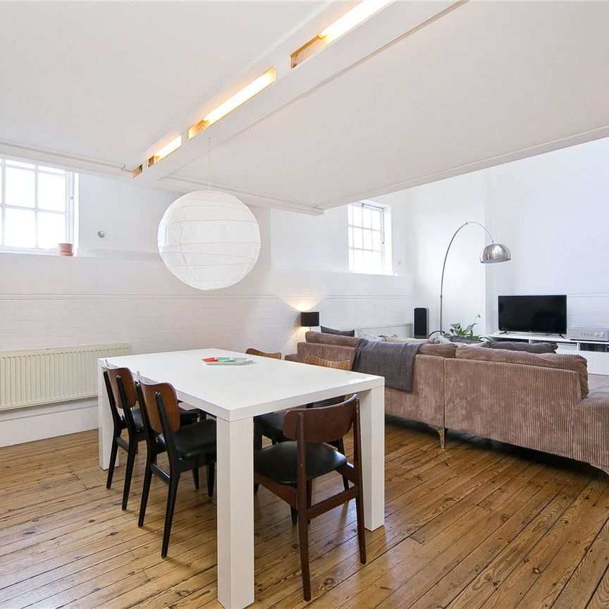 Stunning loft style apartment within a landmark Victorian school conversion - Photo 1