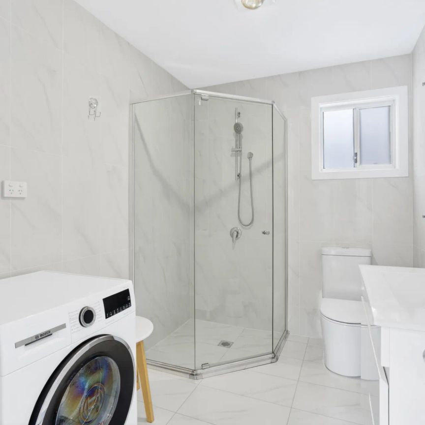 Fully Furnished Coastal Retreat with Private Entry - Photo 1