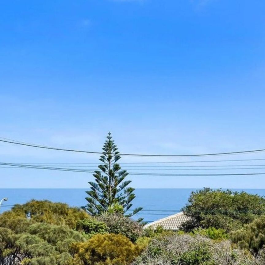Coastal Convenience Meets Low-Maintenance Living - Photo 1