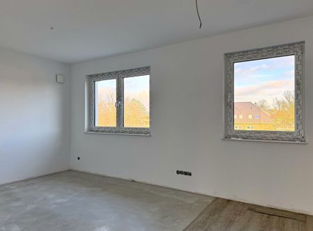 Ihr neues Zuhause: Neubau-Penthousewohnung mit Balkon inmitten von Remels - Uplengen - Photo 3
