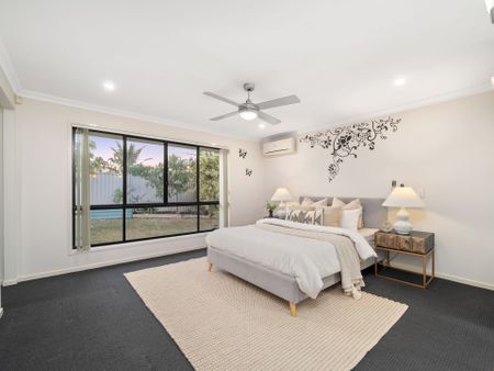 MODERN HOME WITH MULTIPLE LIVING AREAS + SOLAR - Photo 3