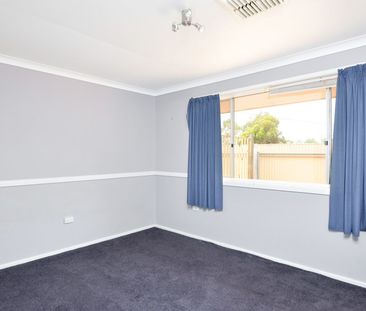 Neat & tidy brick home with large shed - Photo 1