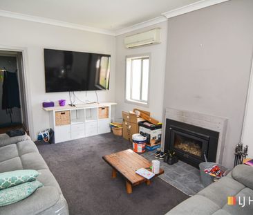 FAMILY HOME AND ROOM FOR ALL THE CARS - Photo 1