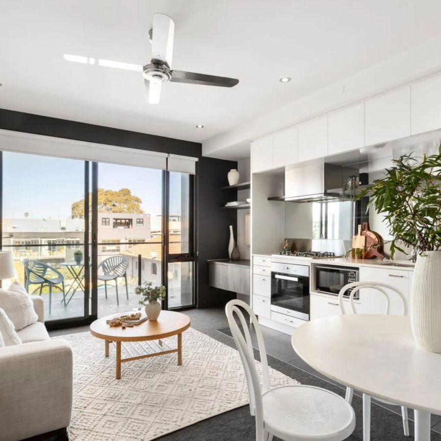 Stylish Second-Floor Retreat with Alfresco Balcony! - Photo 1