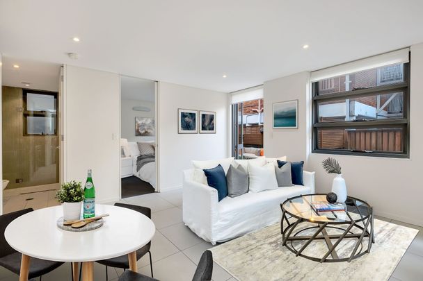 Modern 1 Bedroom Apt with Secure Parking in Great Location - Photo 1