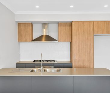 Looking to live near Wyndham Vale Square Shopping Centre? This home... - Photo 6