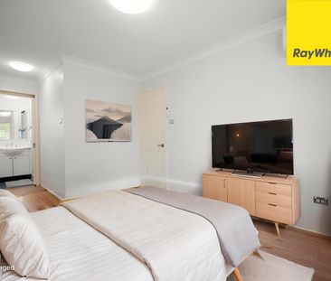 UPDATED STREET-FACING TOWNHOUSE WITH SPACE, STYLE & CONVENIENCE - Photo 4