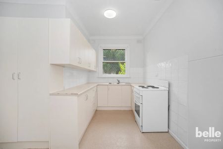 Comfortable 3-Bedroom Home with Spacious Yard in a Convenient Location - Photo 4