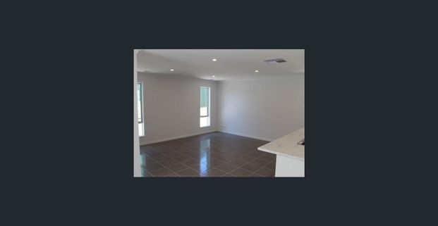 NEW MODERN THREE BEDROOM TOWNHOUSE WITH SOLAR - Photo 1