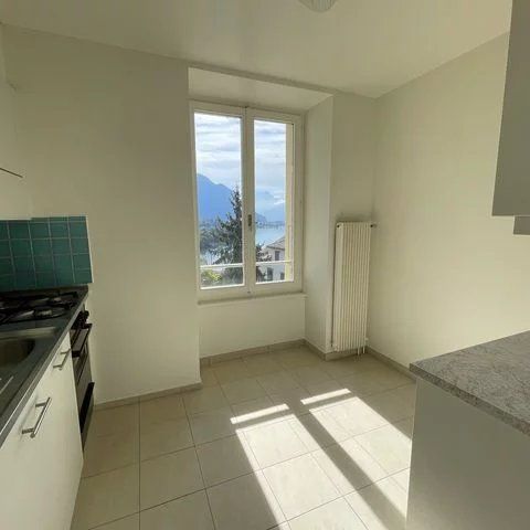 Appartement de 3.5 pièces au 4ème étage avec vue sur le lac. - Photo 1