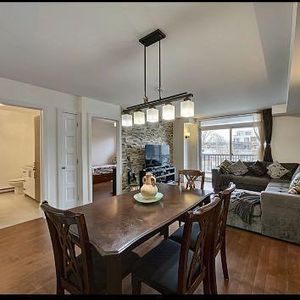 Un grand condo insonorisé 4et 1/2 dans une résidence calme et bien entretenue. • Grande aire ouverte. • 2 chambres à coucher avec rangements. • Salle - Photo 2