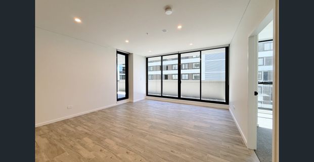 Brand New and Spacious Waterfront three bedrooms | Natural light throughout | Prime location access to everything - Photo 1