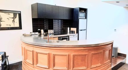 **2026 Heritage Meets Modern Luxury - Fully Furnished Apartment in the Empire Building** - Photo 3