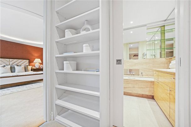 A smart and spacious three bedroom flat on the first floor of this well run portered building with favoured south facing views over Gloucester Square itself. EPC rating: B | Council Tax Band H - Photo 1