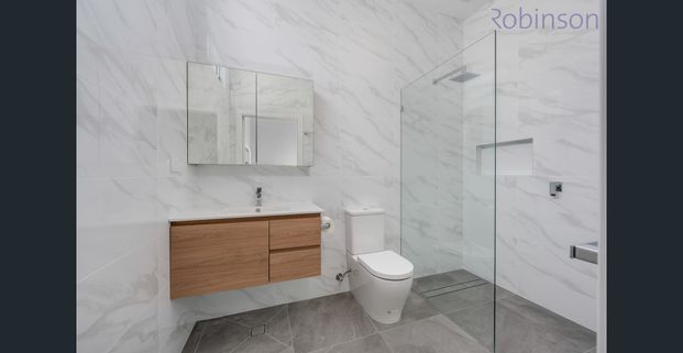 Renovated 3 bedroom home with a white picket fence - Photo 1