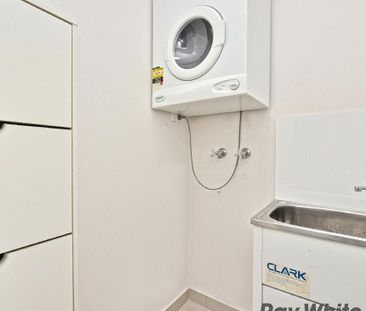 Spacious Three-Level Townhouse with Oversized Garage - Photo 4