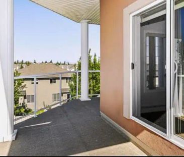 Bright & Spacious 2-Bedroom Corner Condo | Park & Playground Across | Heated Par — 2 Bedrooms Condo Unit - Photo 1