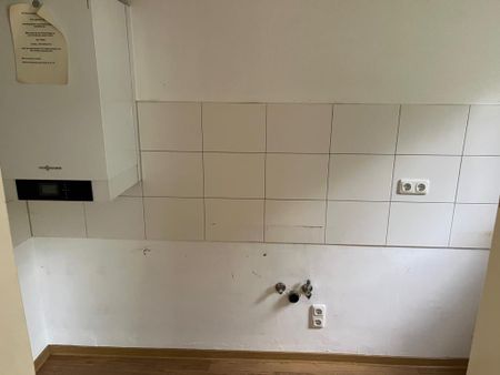 Helle Zwei-Zimmer-Wohnung im Erdgeschoss ab sofort zu vermieten! - Foto 2