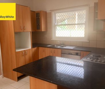 Spacious 4-Bedroom Home in a Convenient Location! - Photo 1