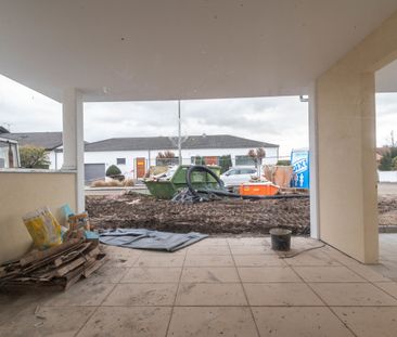 Nachhaltige Erdgeschoss-Souterrainwohnung mit Gartenanteil - Neubau! - Photo 3