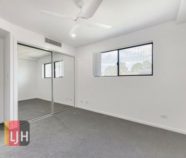 PARKSIDE TWO-BEDROOM UNIT IN A SMALL, QUIET COMPLEX - Photo 2