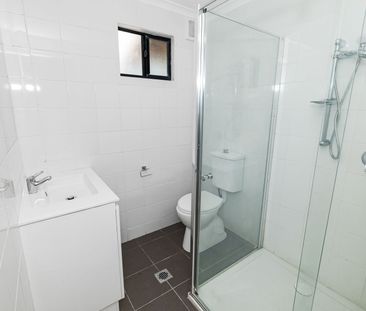 Elevated 4-bedroom home with granny flat - Photo 6
