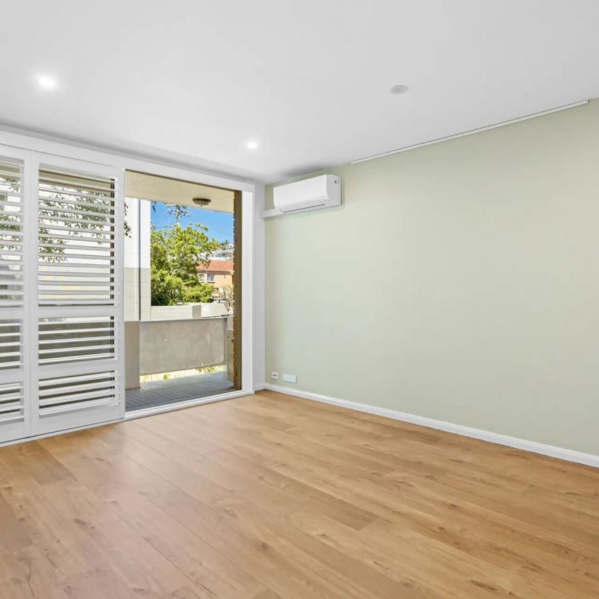 Stylish Coastal Living in a Prime Lifestyle Location - Photo 1