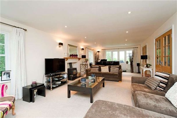 A comfortable and stylish five bedroom family home with wonderful views over the Stonor Valley, offering a maintained garden and is situated within close proximity of Henley-on-Thames. - Photo 1